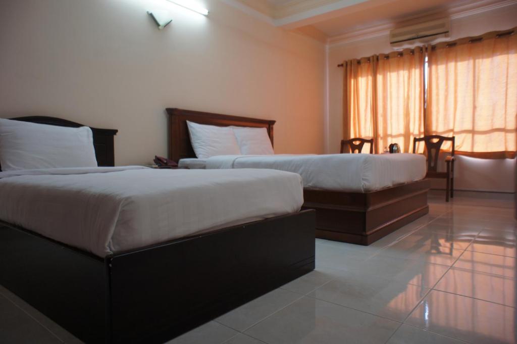 Elegant Inn Ho Chi Minh-stad Kamer foto